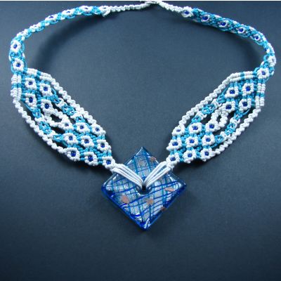 Blue macrame pendant "Peter's motives" with glass bead